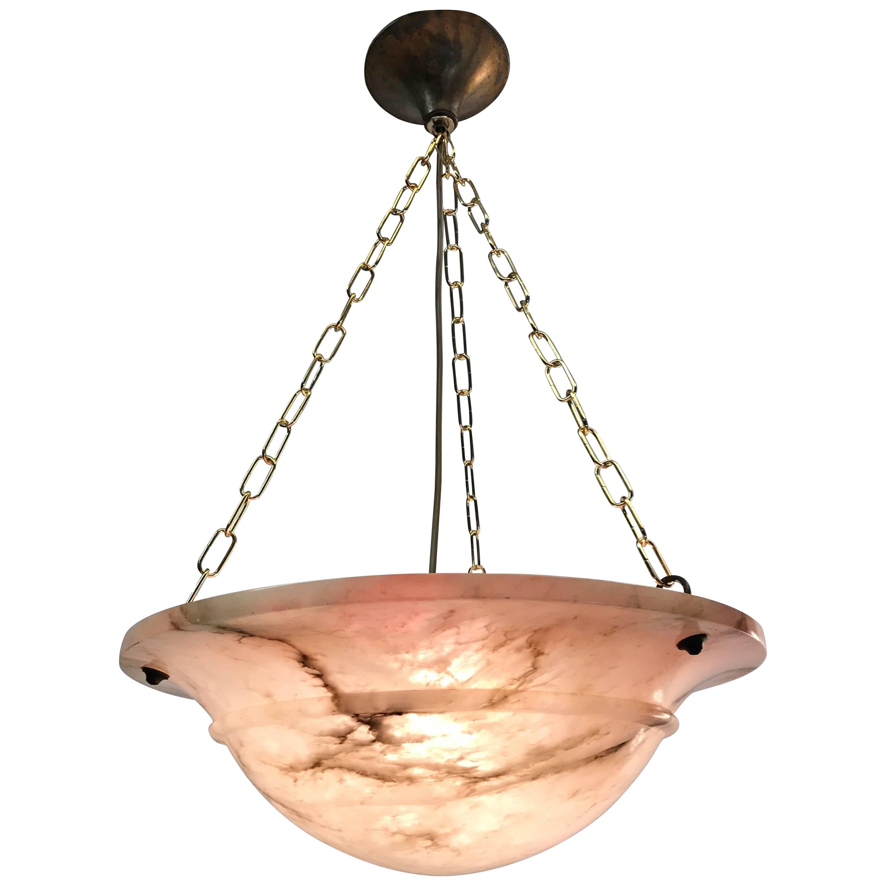 Beautiful shape and good condition Art Deco ceiling lamp.  

This wonderfully designed and truly beautiful light fixture has been very well looked after by its former owners. This great design, antique alabaster shade is one of our other most