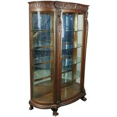 R.J. Horner Bros. Figural Carved Oak Mirror Back China Cabinet, circa 1890