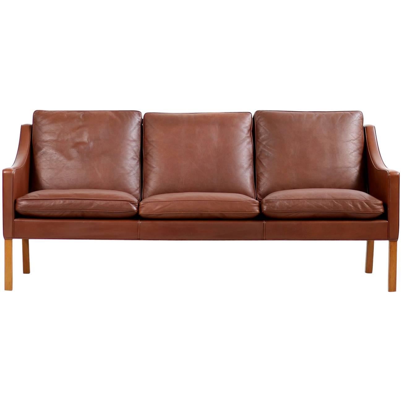 Beautiful 1960s Borge Mogensen 2209 lounge sofa, cognac or brown leather, fantastic condition, cushions were reupholstered for more comfort, solid legs.