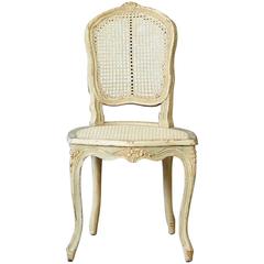 Antique 19th Century French Paint Decorated Caned Vanity Chair in the Style of Louis XV