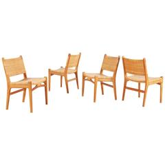 Vintage Hans J. Wegner, Set of Four "CH31" Oak and Cane Chairs, 1950s