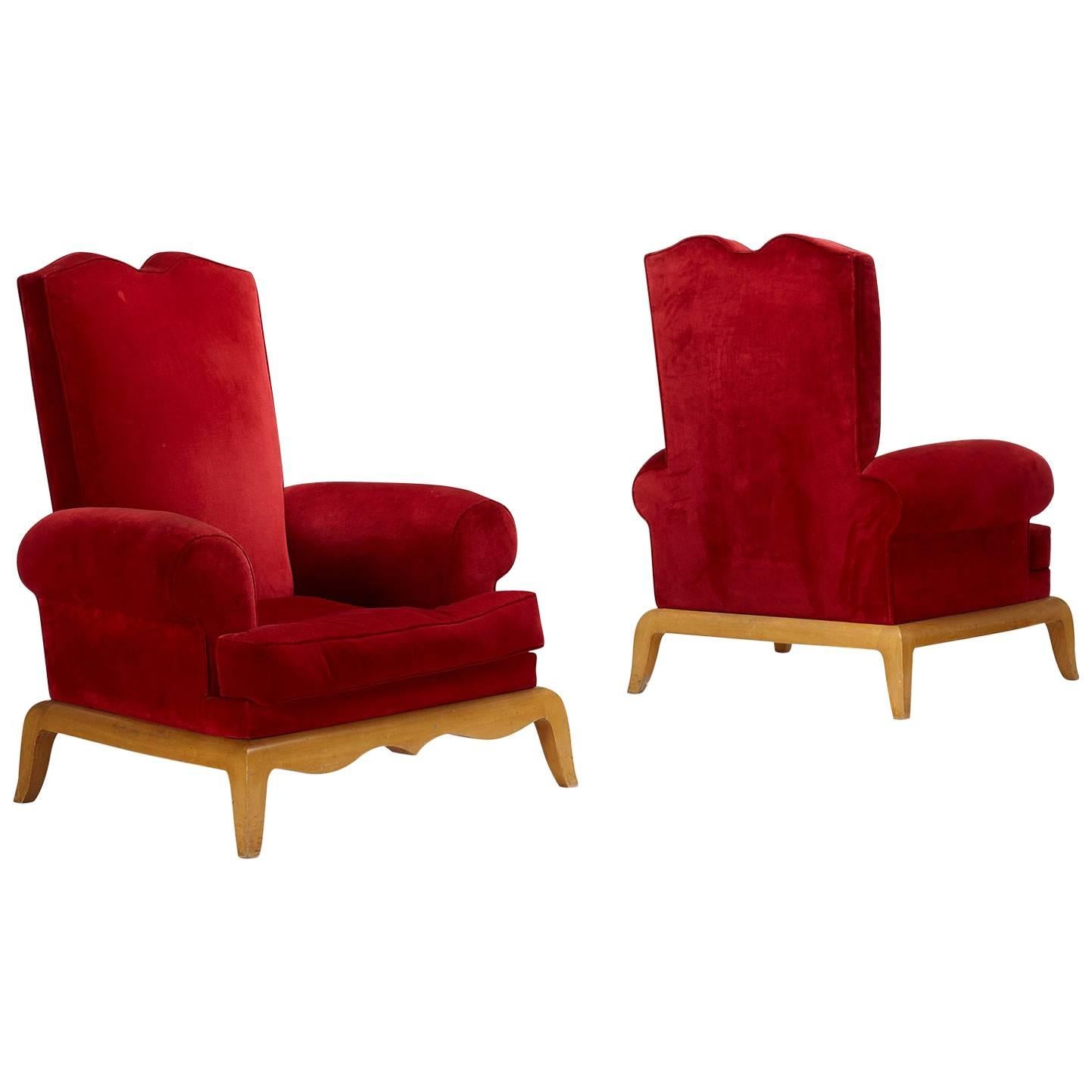 Pair of Lounge Chairs by René Prou For Sale
