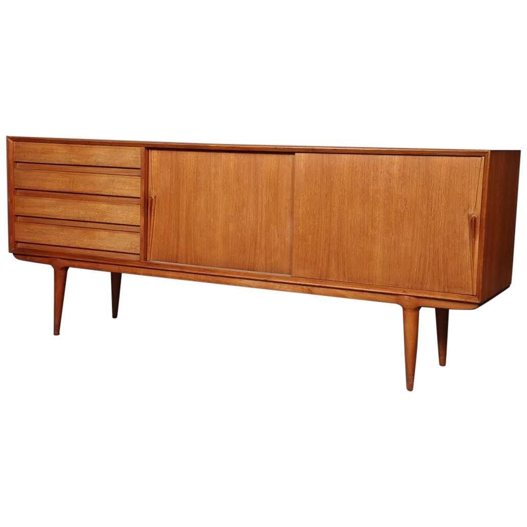 Rare Model 18 Teak Sideboard Having Four Drawers and Two Sliding Doors