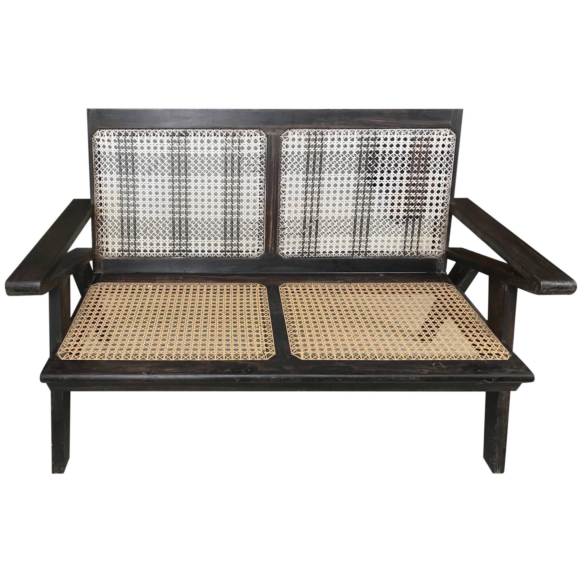 Anglo-Indian Solid Ebony and Cane Two-Seat Sofa For Sale