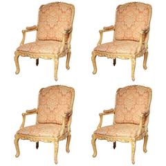 Set of Four Louis XV Carved Gilt Fauteuil's