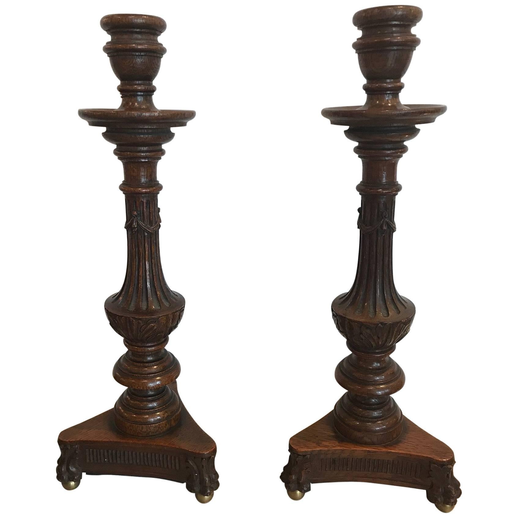 Pair of Hand-Carved Dark Oak Candlesticks