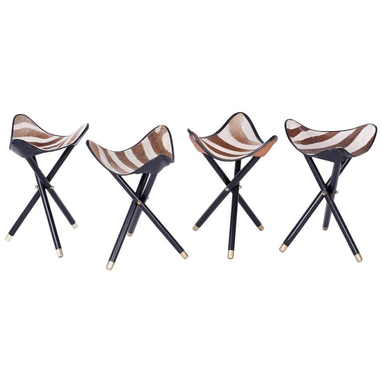 Group of Four Campaign Style Zebra Hide Folding Stools, Available