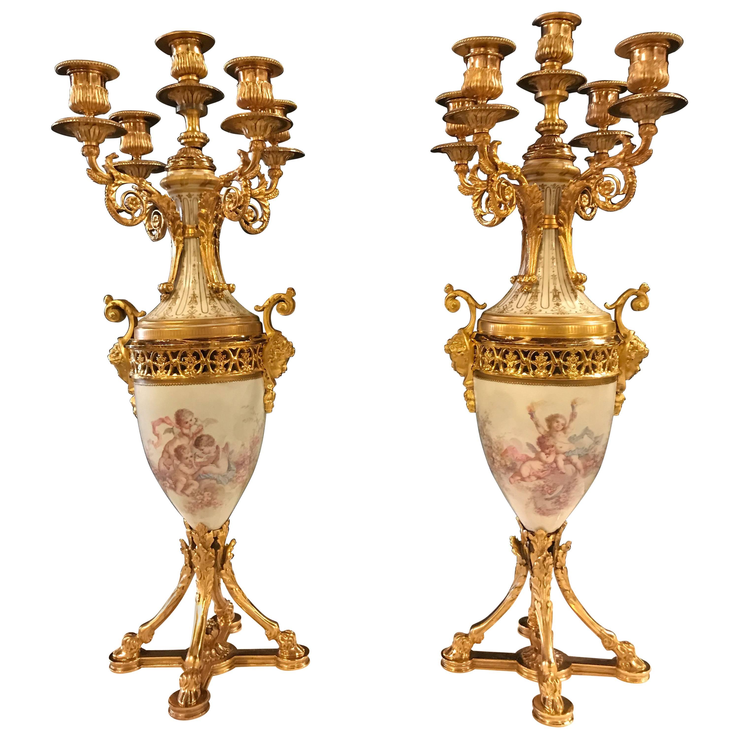 Fine Pair of Gilt Bronze and Porcelain Candelabra with Cherub Painting