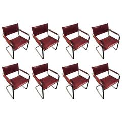 Vintage Incredible Set of Eight Tubular Chrome Chairs with Burgundy Leather Upholstery