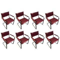 Incredible Set of Eight Tubular Chrome Chairs with Burgundy Leather Upholstery