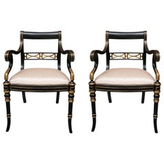 Pair of Regency Style Ebonized and Parcel Gilt Armchairs