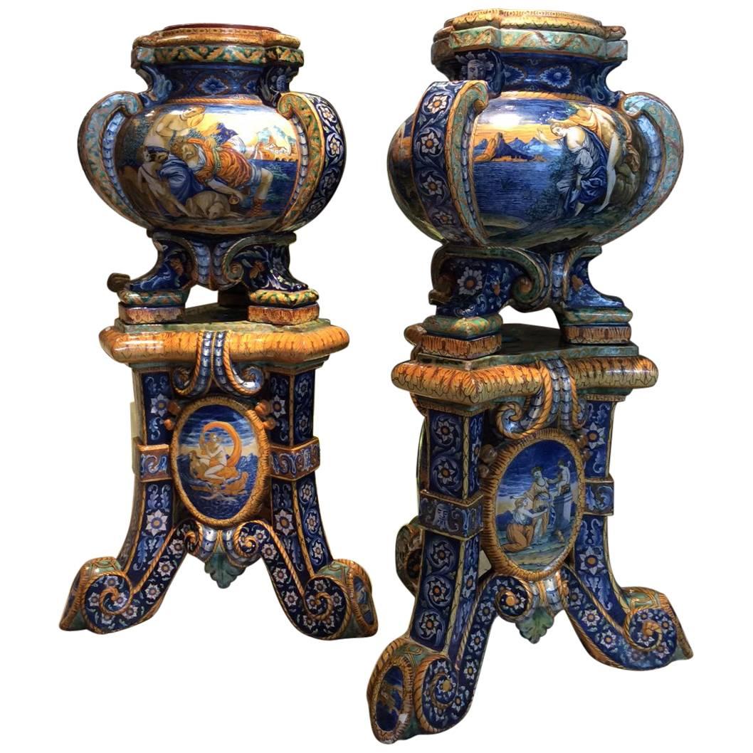 Pair of Gardeners with their stand in Faience, Urbino Workshop, Italy 19th century with mythological decorations on all sides.
The term "Majolica" refers to the Italian faiences dating from the 16th century in Tuscany and Emilia