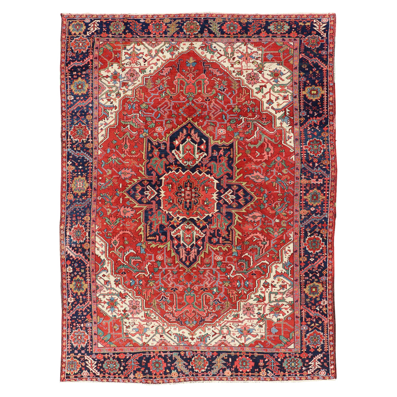 Antique Heriz Carpet with Stylized Central Medallion Set on Tomato Red Field
