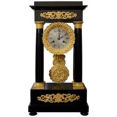 Early 19th Century Ormolu and Ebonized Wood Empire Portico Clock 5