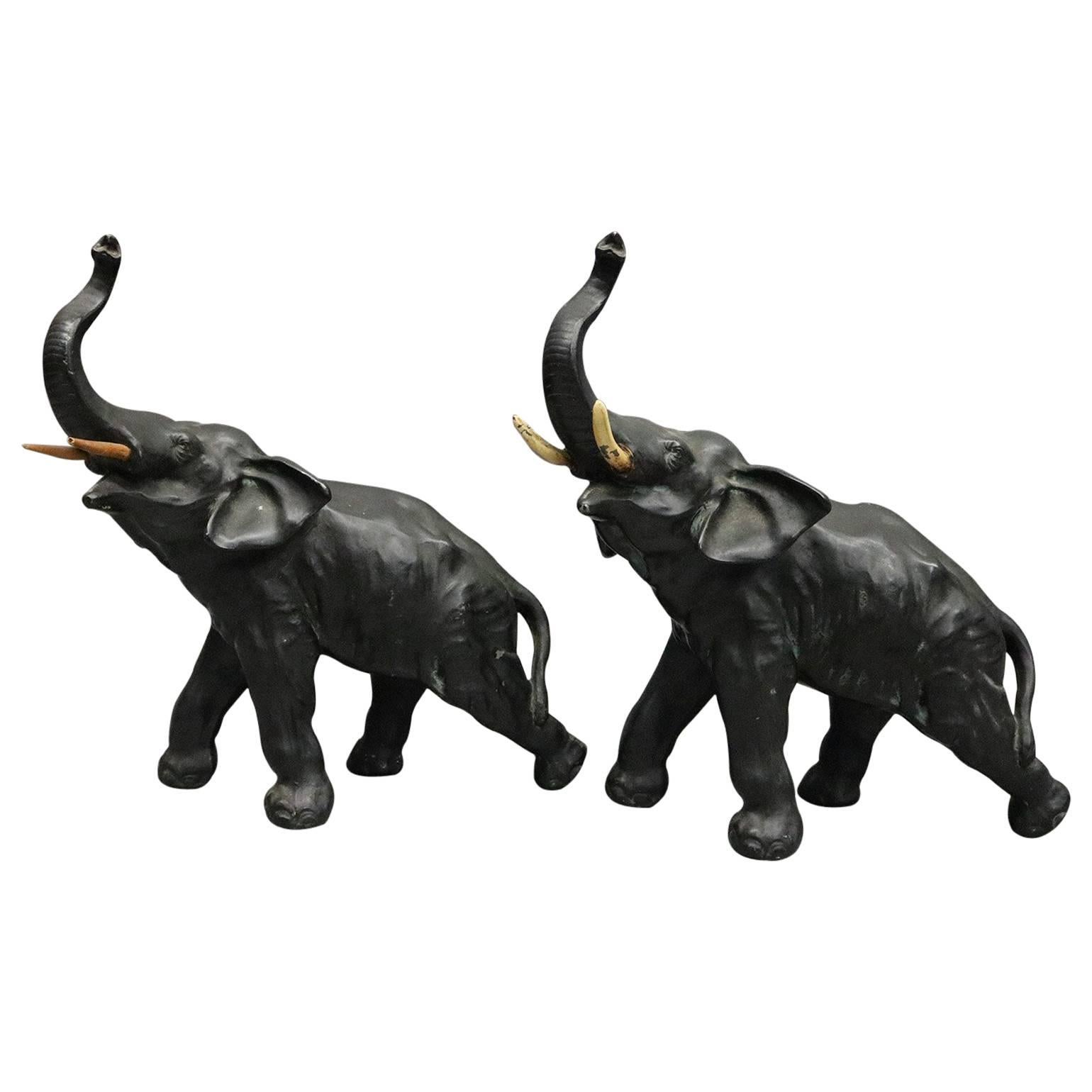 Pair Antique Bronzed Asian Bull Elephants in Motion, circa 1900