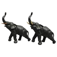 Pair Antique Bronzed Asian Bull Elephants in Motion, circa 1900