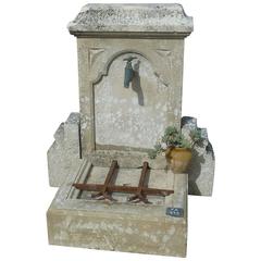 Small Water Fountain with Basin, Sculpted Pediment and Molded Corbels in Stone