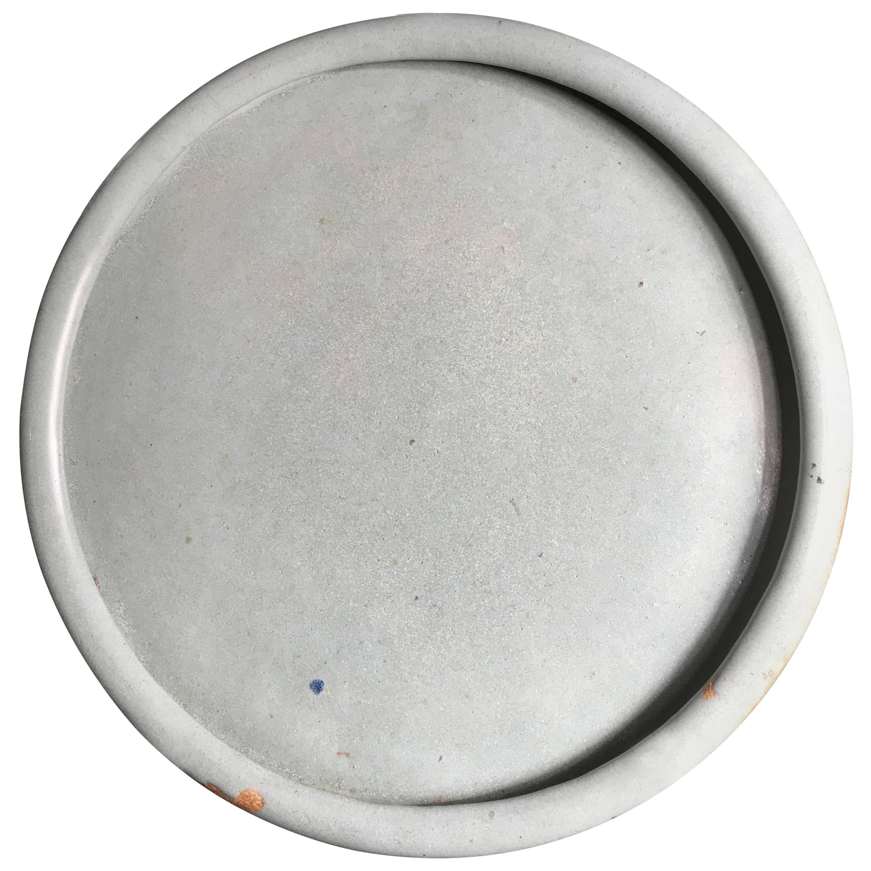 FEBRUARY SALE - NOW SAVE 25% AND MORE

A fine antique Japanese round three footed serving tray crafted in a rich blue celadon drip glazing dating to the Taisho period (1912-1926).

Condition: This thick, heavy well-crafted tray is well preserved
