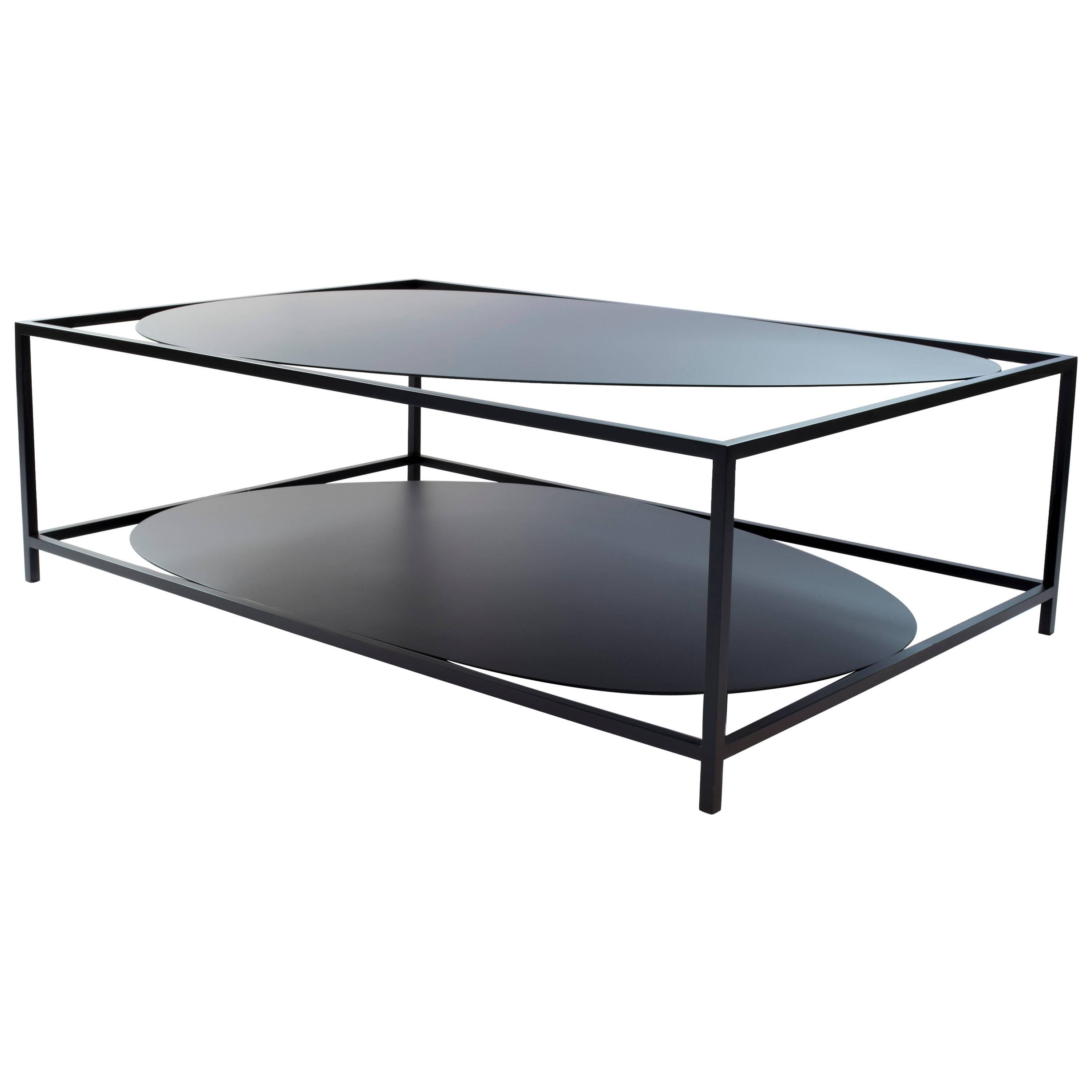 Contemporary minimal hand-painted steel Ahn organic-geometric steel minimal coffee tables is a study in positive and negative space. The sculptural Ahn coffee table is ever changing depending on how it is positioned and viewed in a room. With its