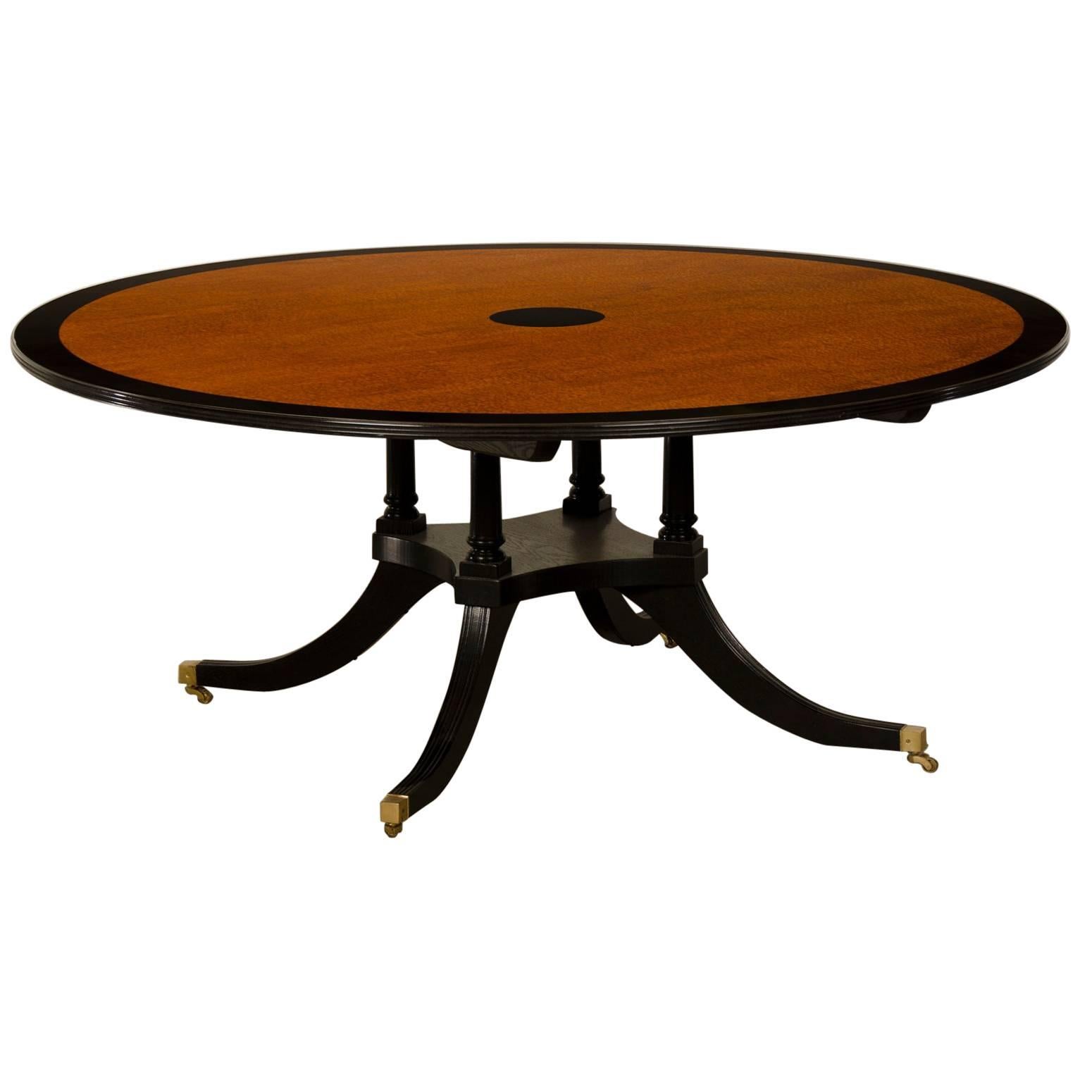 English Sheraton Style Round Dining Table Featuring “Pomelle Sapele” Top For Sale