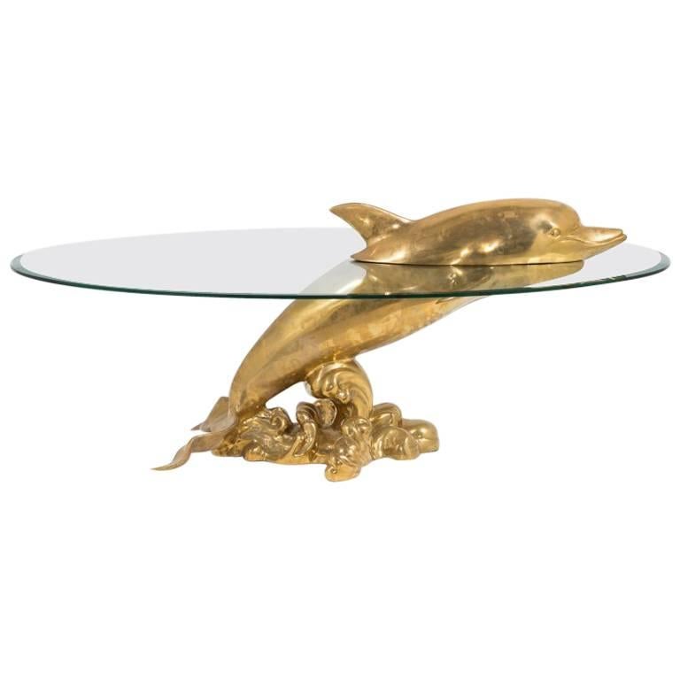 Polished Brass and Glass Dolphin Coffee Table, 1960s For Sale