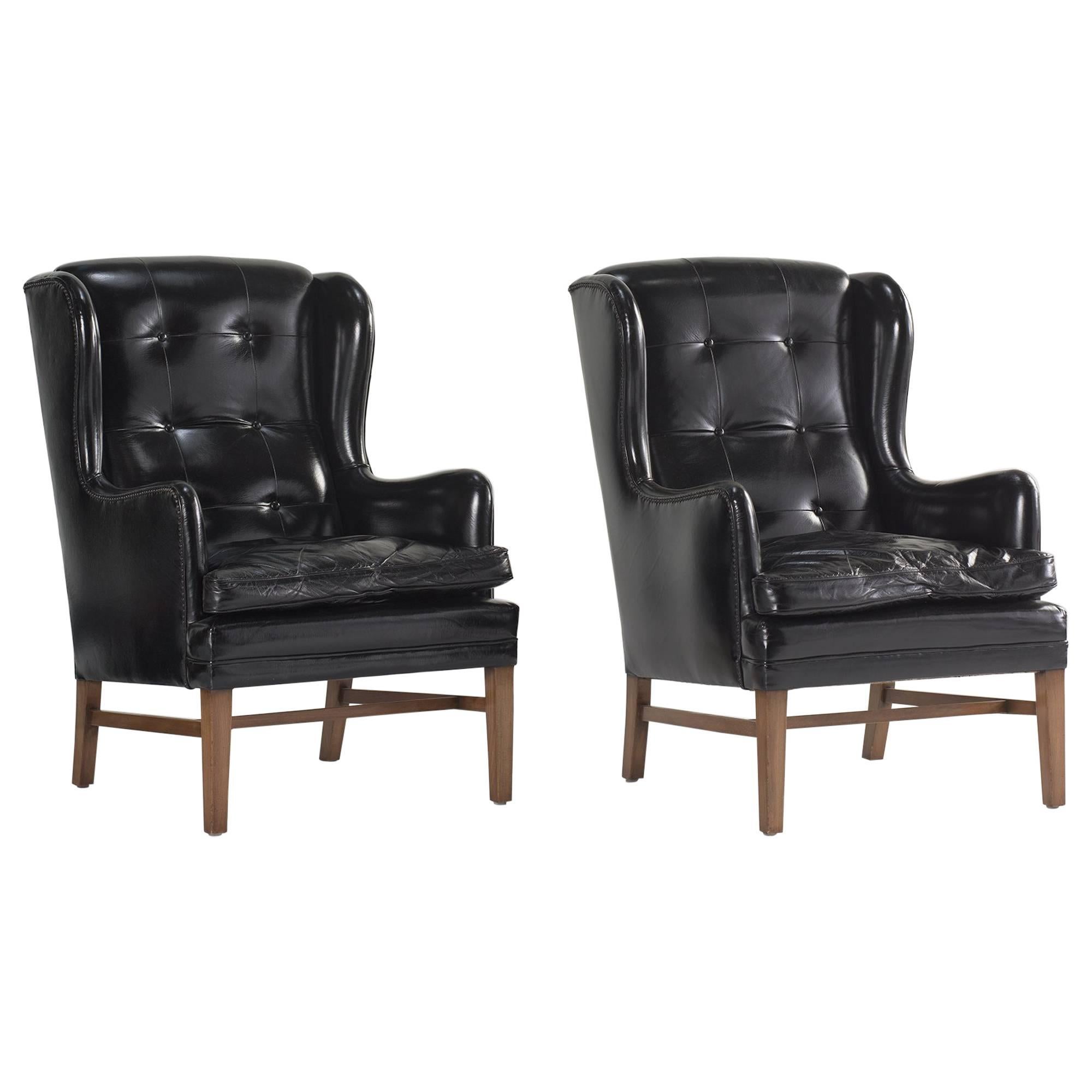 Black Leather Wing Armchairs, Sweden, circa 1950