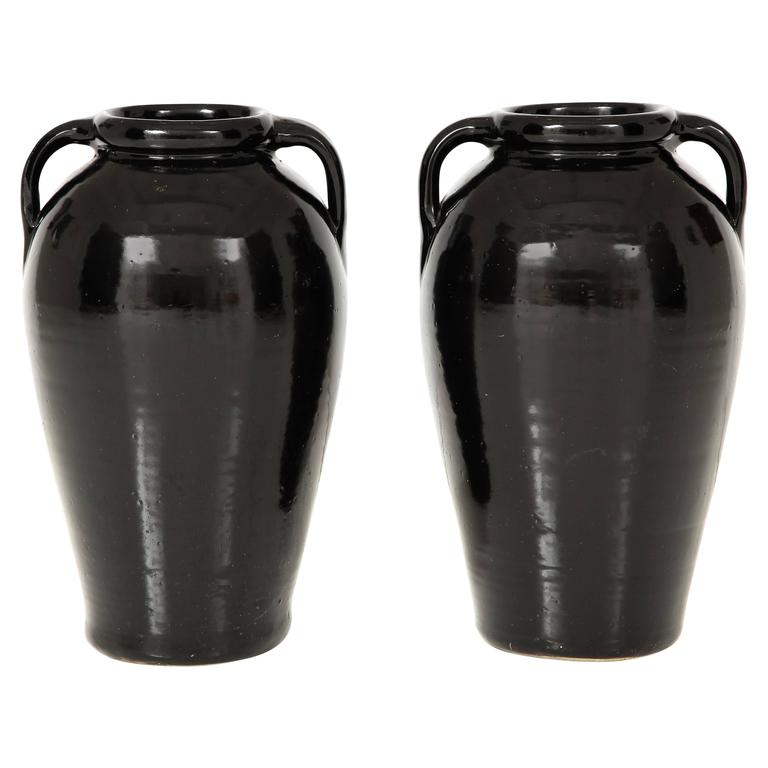 Pair of Tall Black Glazed Stone Ware Vases or Jars with Handles For
