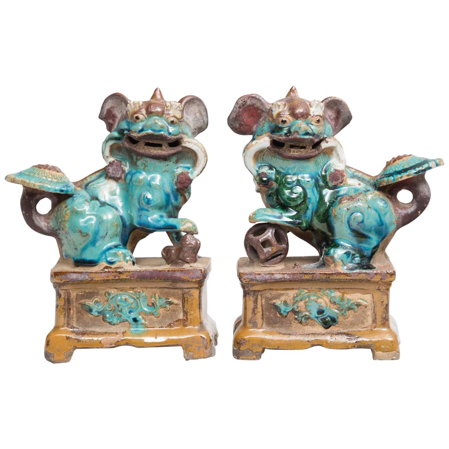 Pair of Chinese Pottery Glazed Foo Dog Incense Holders