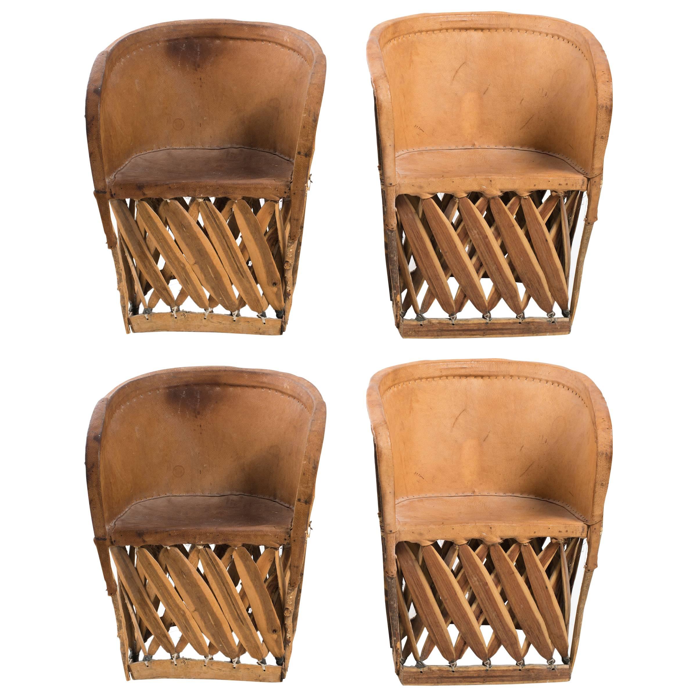 Four Leather Safari Chairs
