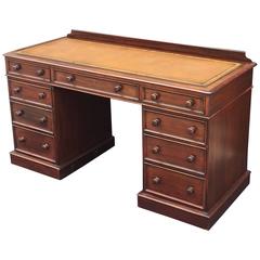 Antique English Pedestal Desk of Mahogany with Embossed Leather Top