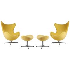 Arne Jacobsen for Fritz Hansen Model 3316 Egg Chairs and Footstools