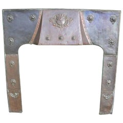 Large Arts and Crafts Copper Fire Insert with a Lion in a Shield Crest