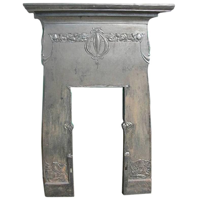 Arts & Crafts Cast Iron Fireplace with Stylized Floral Details For Sale