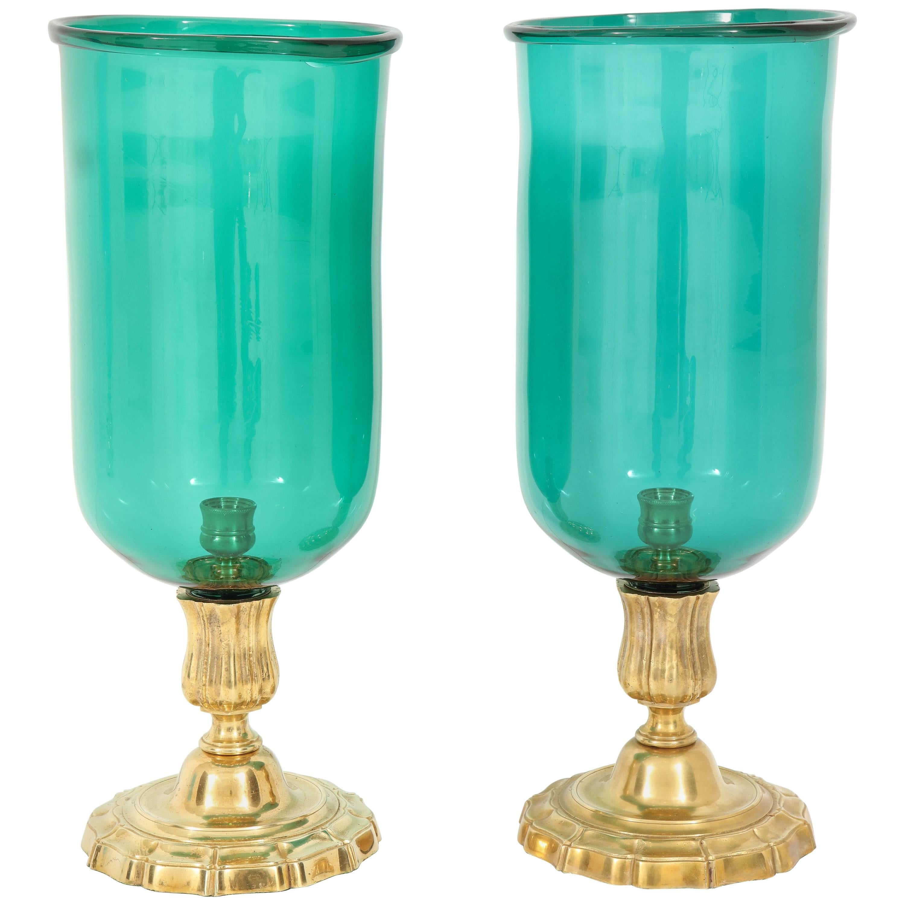 A Pair of  Glass and Gilt Bronze Hurricanes