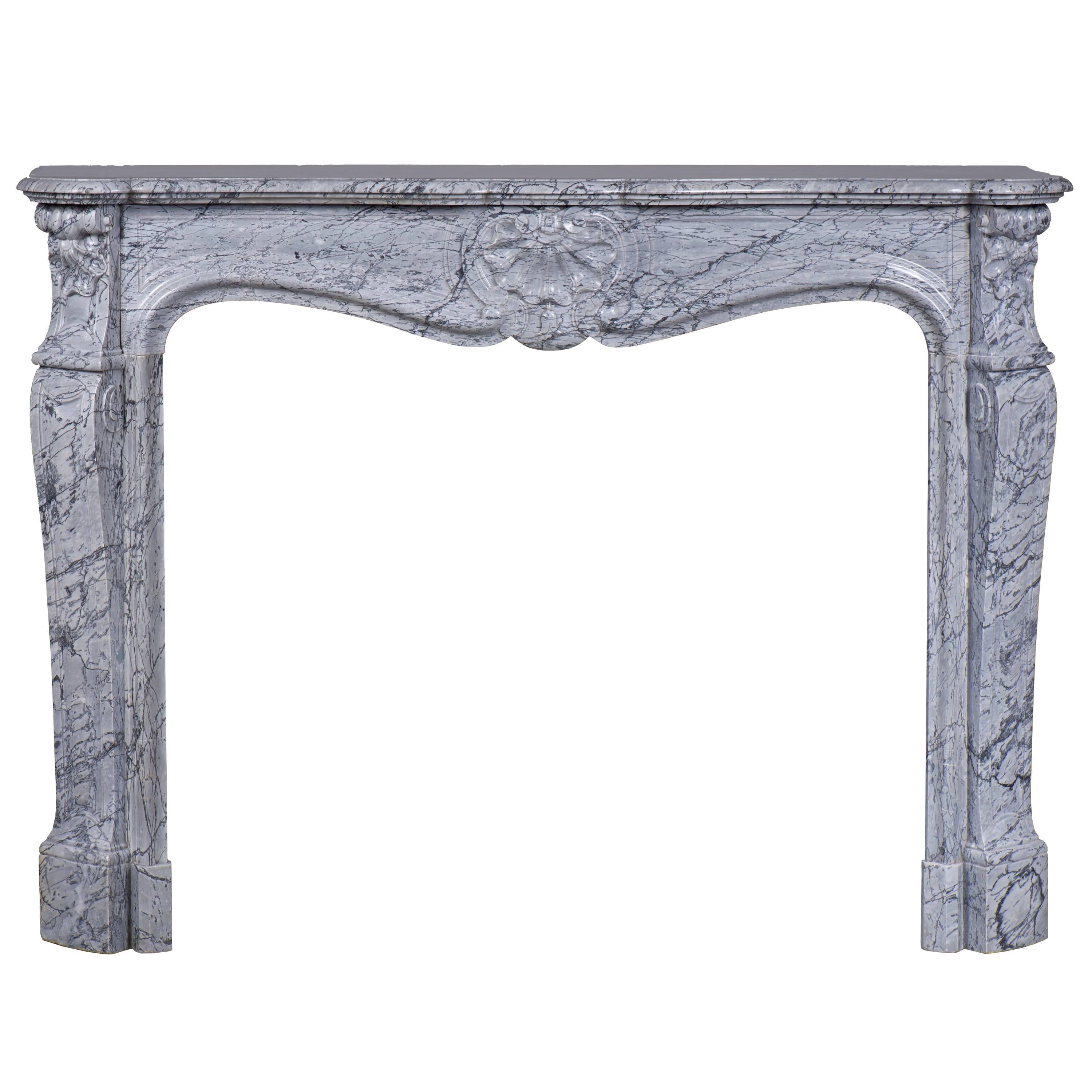 Antique Louis XV Style Fireplace, in Bleu Fleuri Marble, with Three Shells Decor For Sale