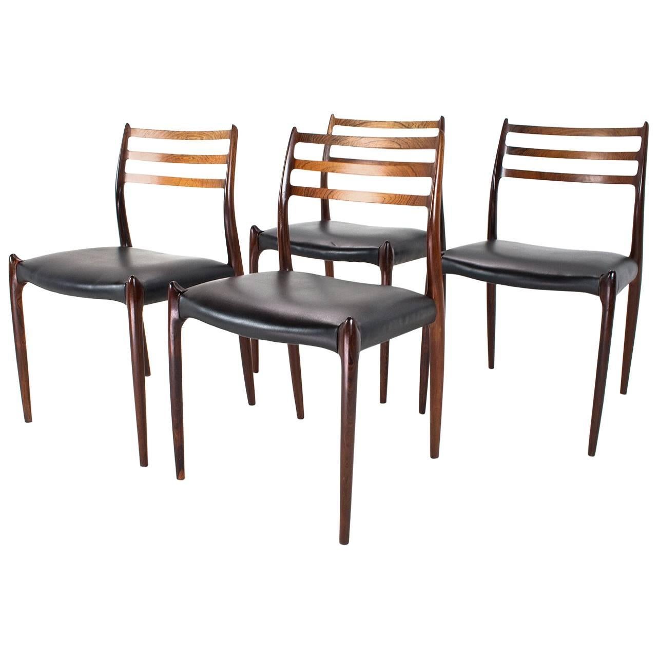 Scandinavian modern set of four dining chairs in rosewood Niels Møller, 1950s