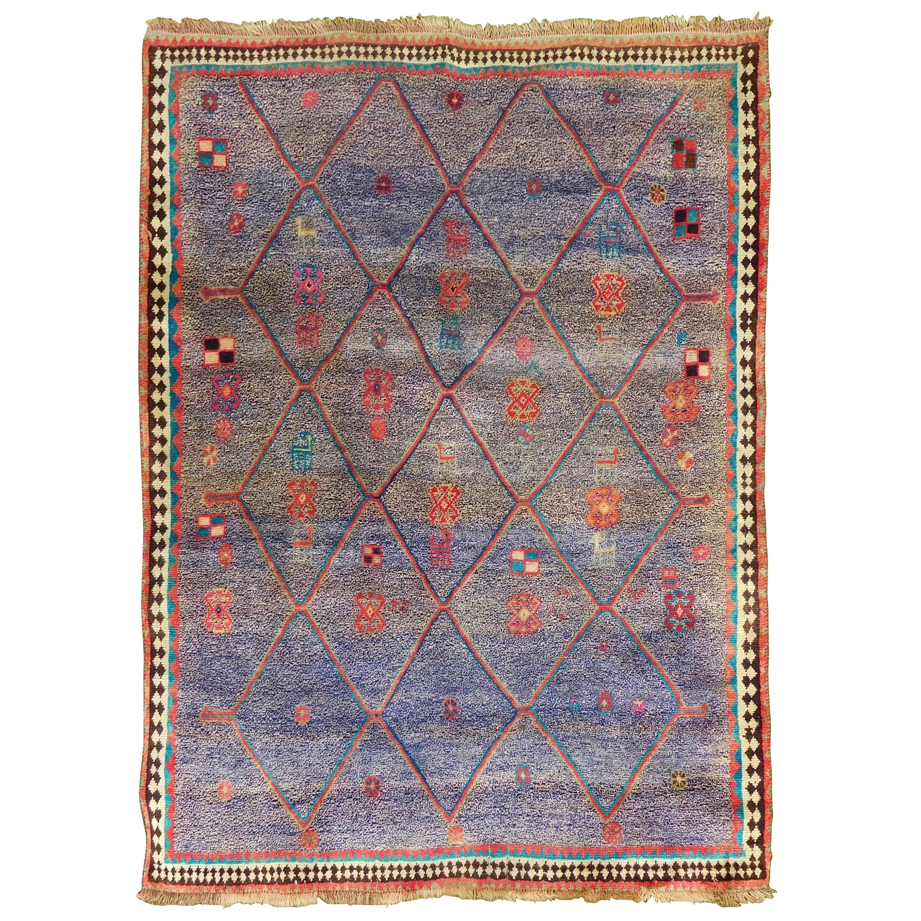 Vintage Persian Gabbeh Rug with Blue Field and Traditional Symbols, circa 1985 For Sale