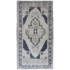 Vintage Royal Blue Turkish Oushak Rug with Ivory Medallion and Botanical Elements