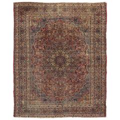 Distressed Antique Persian Mashhad Rug with Modern Industrial Style