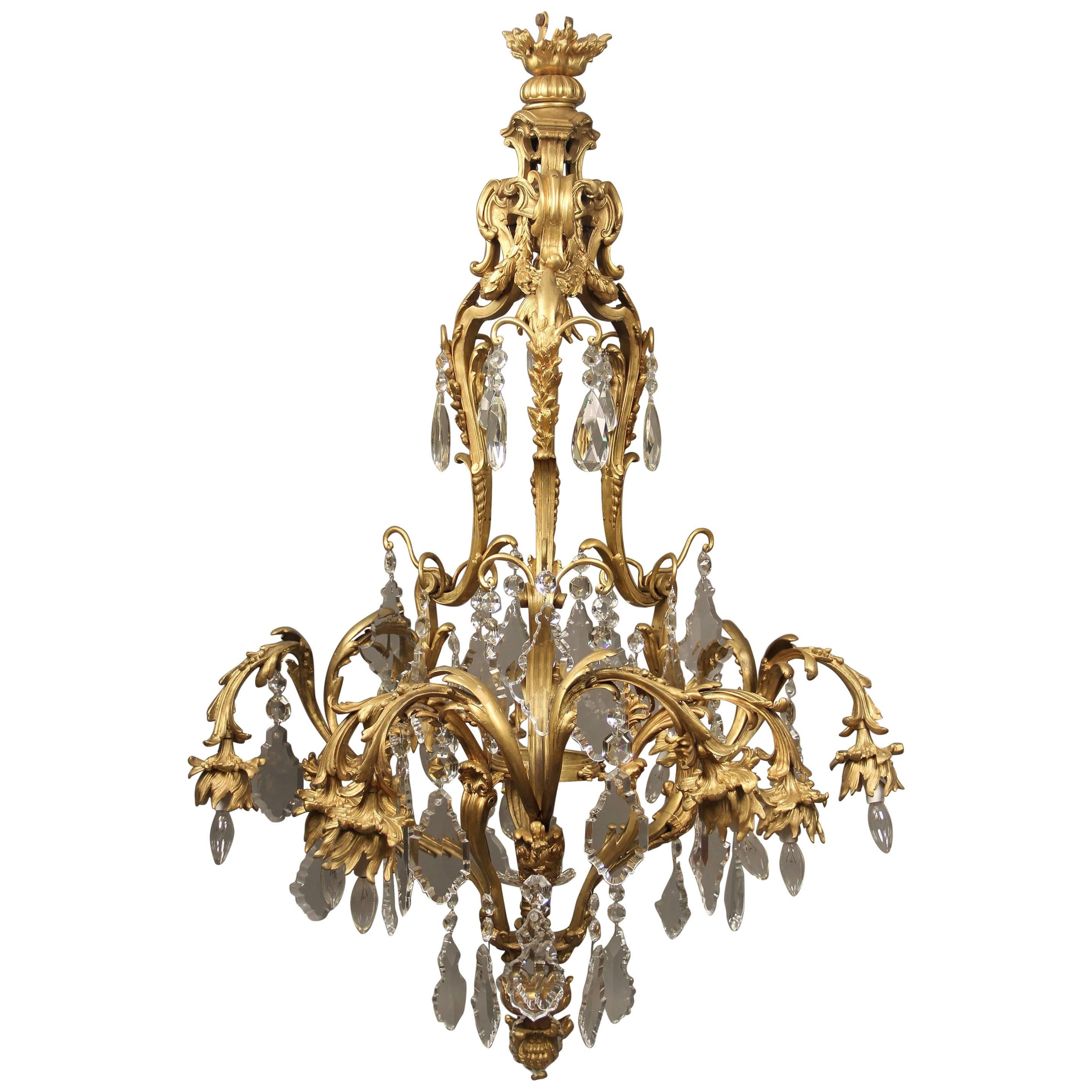 Lustre à onze lumières en bronze doré et cristal du début du XXe siècle en vente