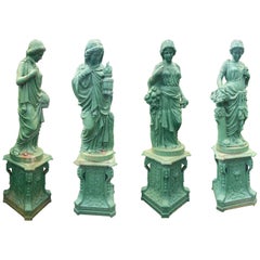 Impressive Set of Four Seasons Cast Iron Statues on Pedestal Bases