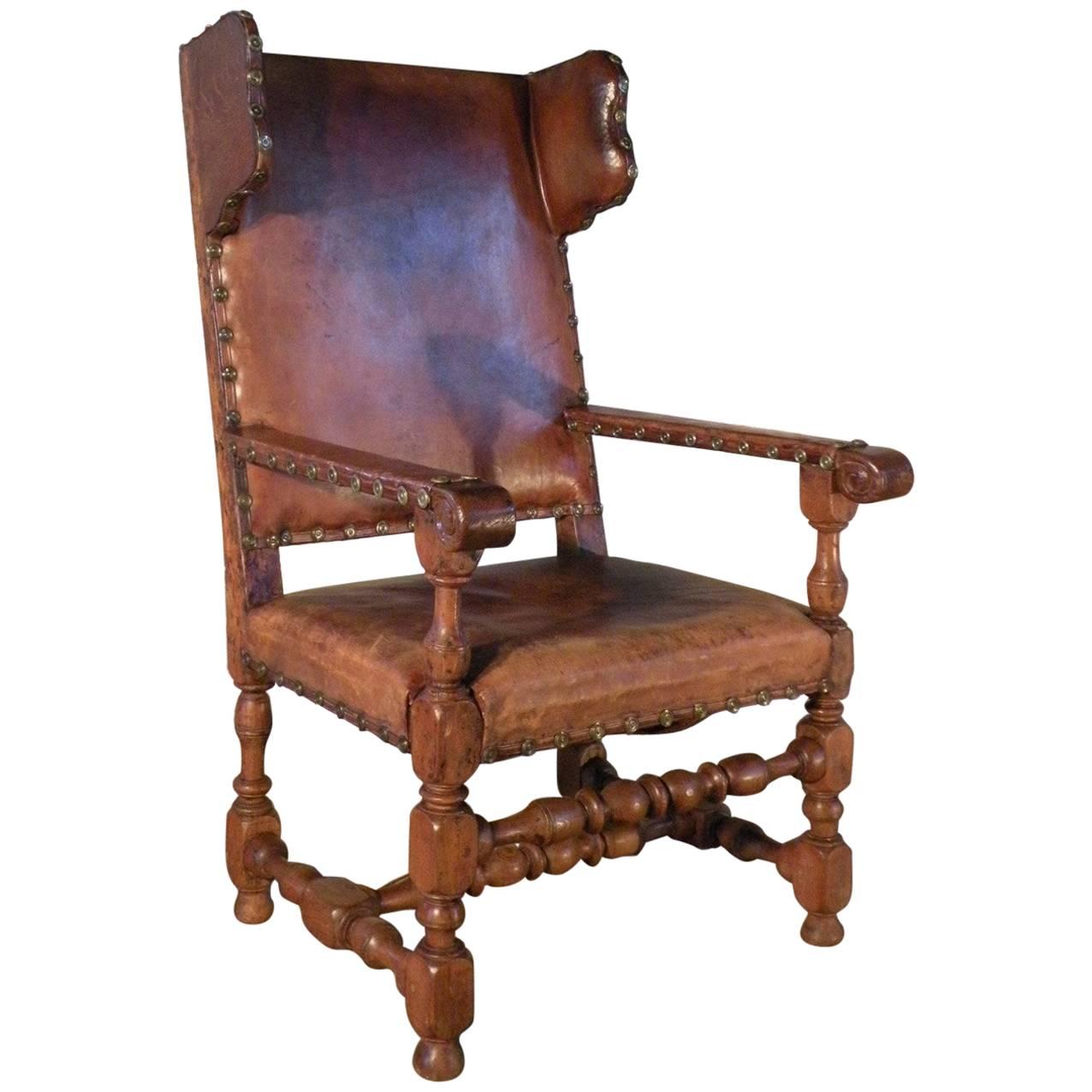 Swedish Baroque 17th Century Leather-Covered Wing Back Armchair For Sale