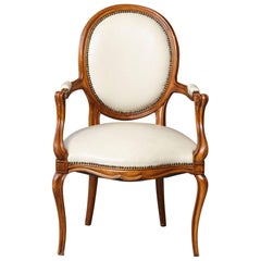 Louis XV Style Walnut Fauteuil in Nail Trimmed Creme Leather