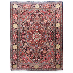 Antique Persian Sarouk Farahan Carpet with Intricate and Colorful Floral Motifs