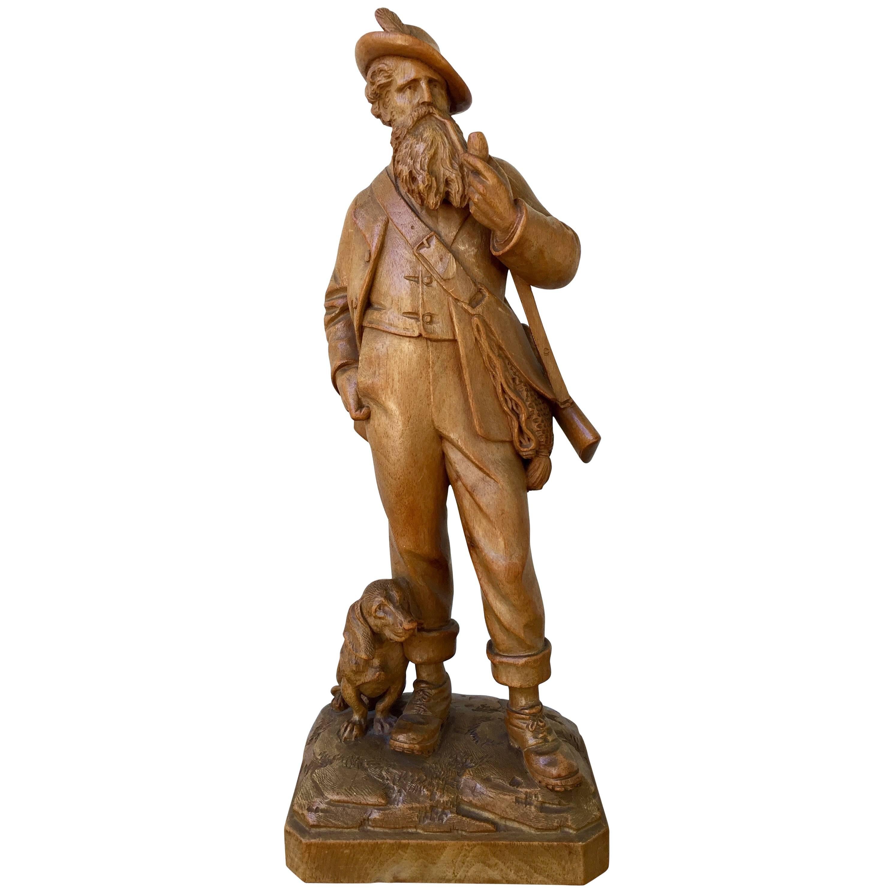 Great Swiss Black Forest Carving of a Hunter and His Dog, 19th Century