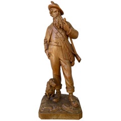 Great Swiss Black Forest Carving of a Hunter and His Dog, 19th Century