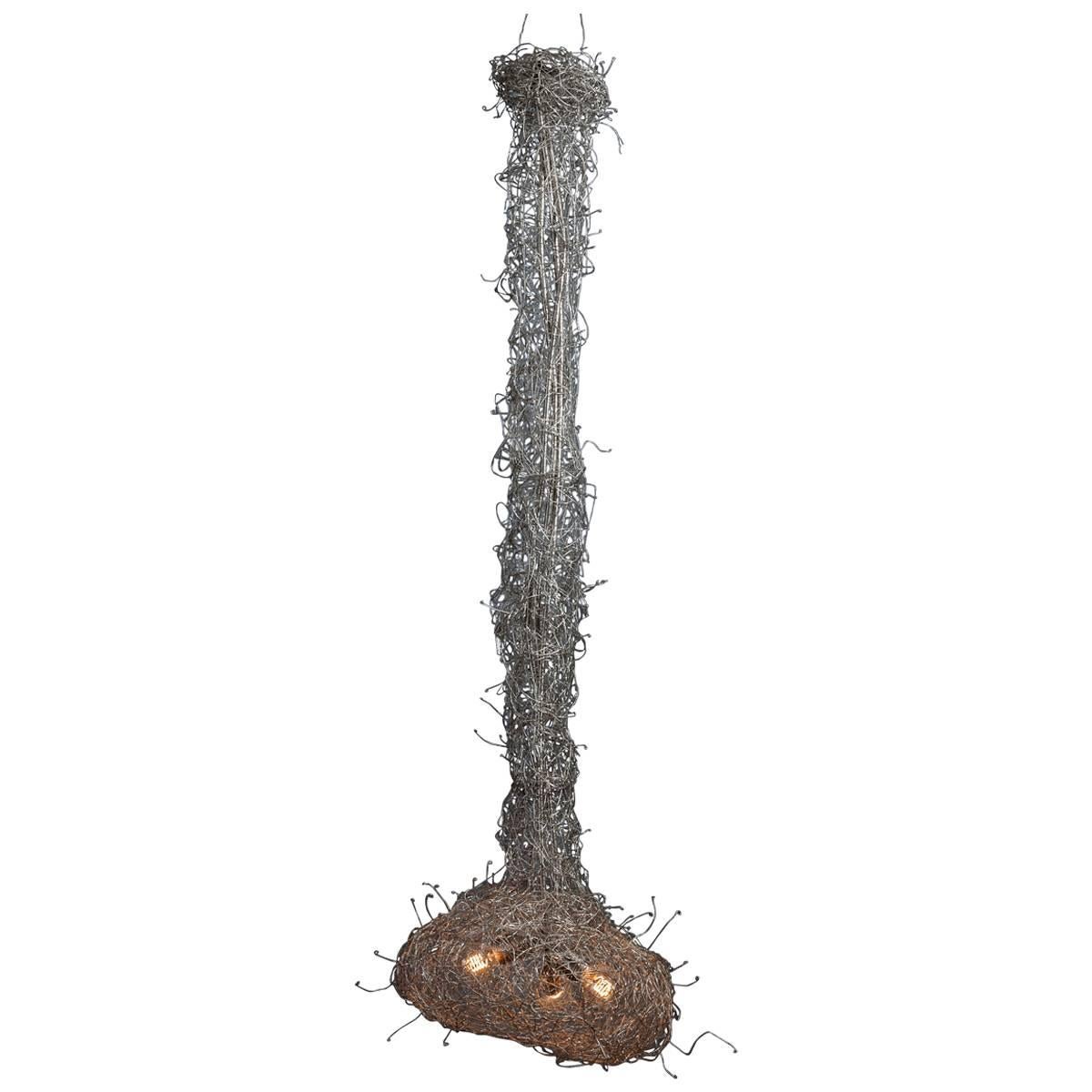 Shortlisted in The Design et al International Product Design Awards, 2016.
Handwoven hammered stainless steel decorative ceiling lamp.
The “spun” stainless steel design is reminiscent of a Cocoon and gives off a soft light that is enhanced by the