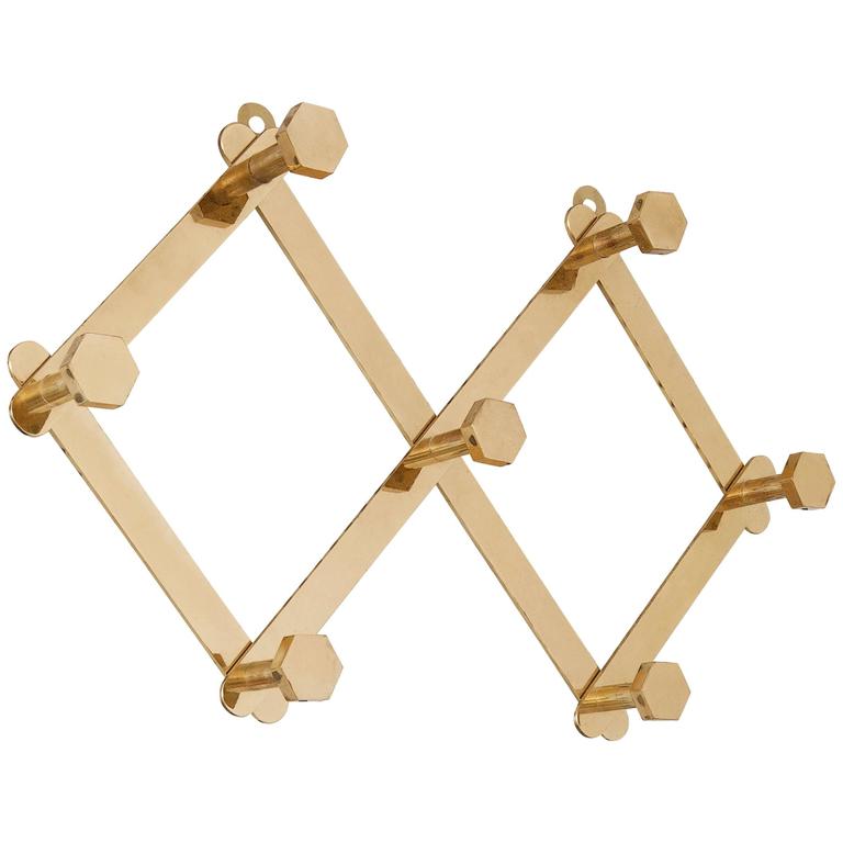 Vintage Coat Hanger in Brass For Sale