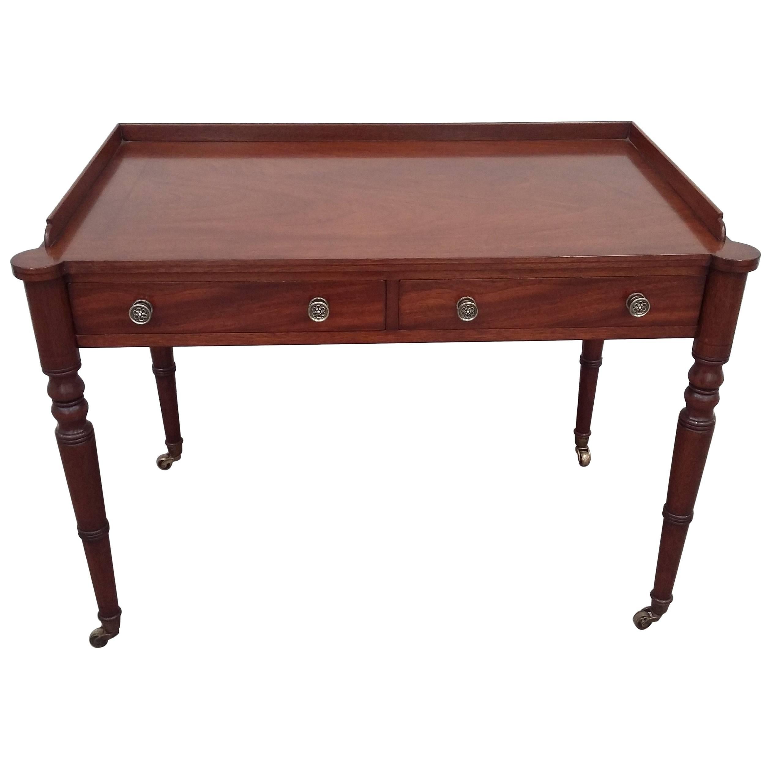 Arthur Brett Mahogany Serving Table with Two Drawers on Brass Castors For Sale