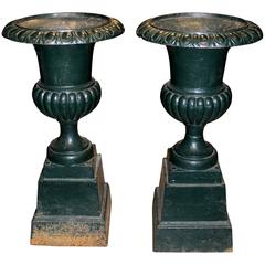 Pair of Green Painted Victorian Iron Urns on Attached Bases